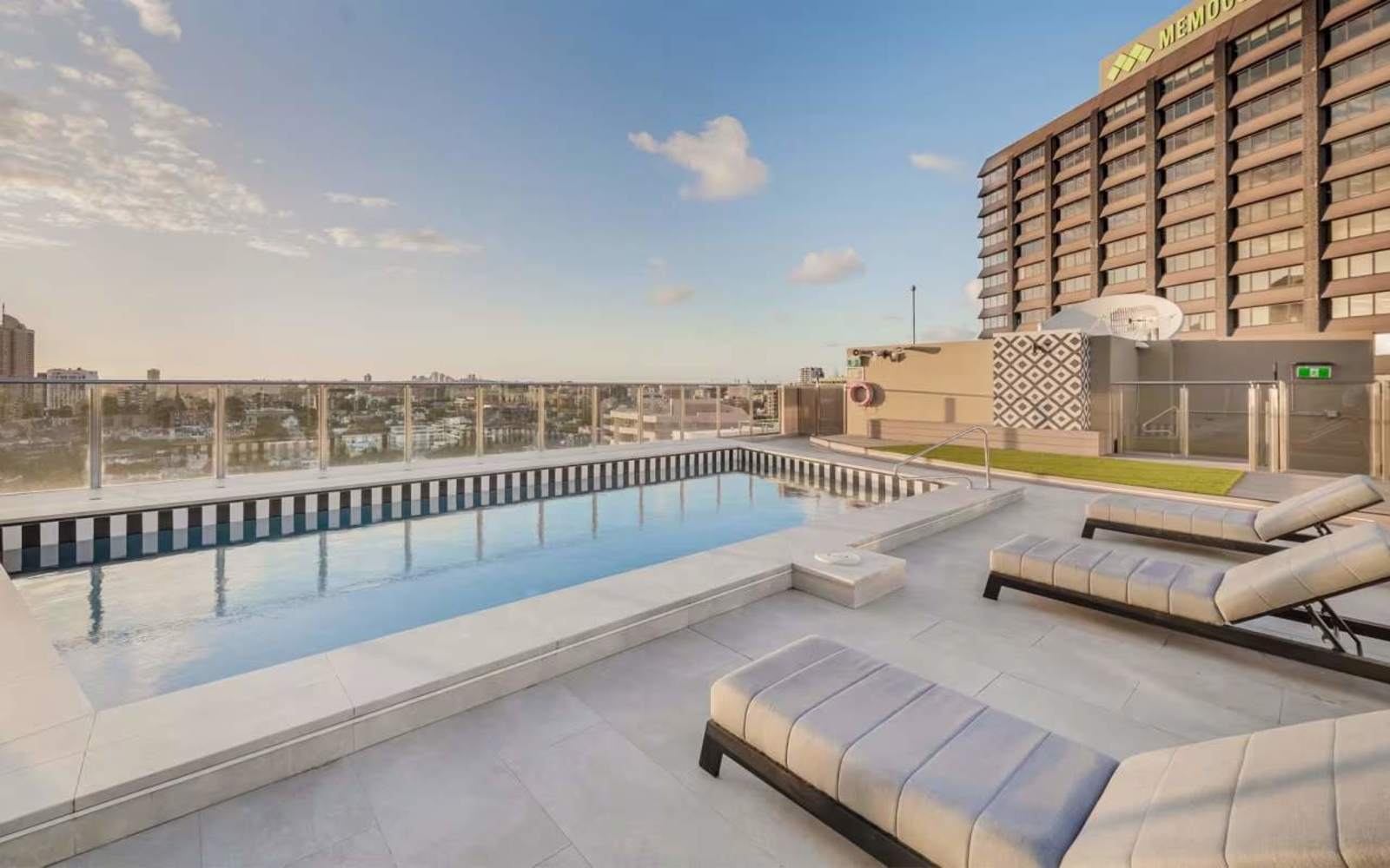 Rooftop pool of a Darlinghurst apartment building where MetaWise manages a studio, looking across to the city skyline.